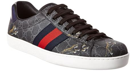 gucci supreme tiger sneakers|Gucci ace low top sneakers.